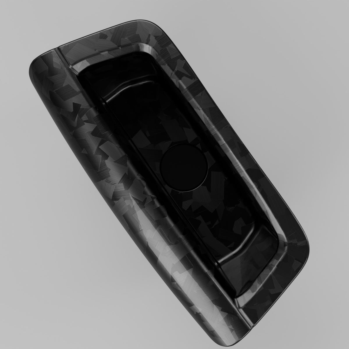 Ford Falcon FG carbon fibre door pull cup, gloss forged, top-down view with matte black screw cap fitted