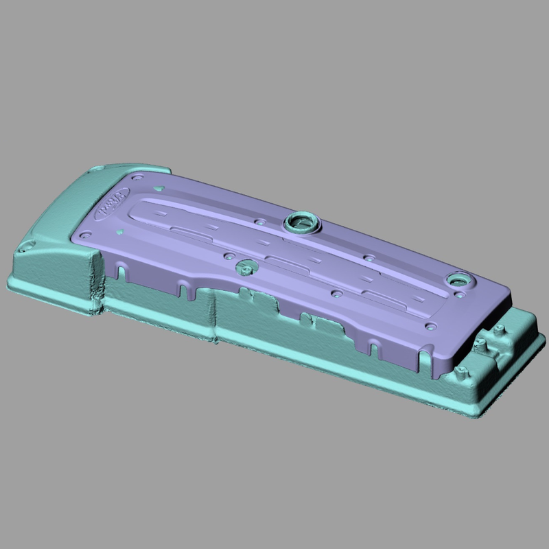 3D scan of the factory FG coil cover in purple sitting in position on the 3D scan of the factory Barra rocker cover in teal