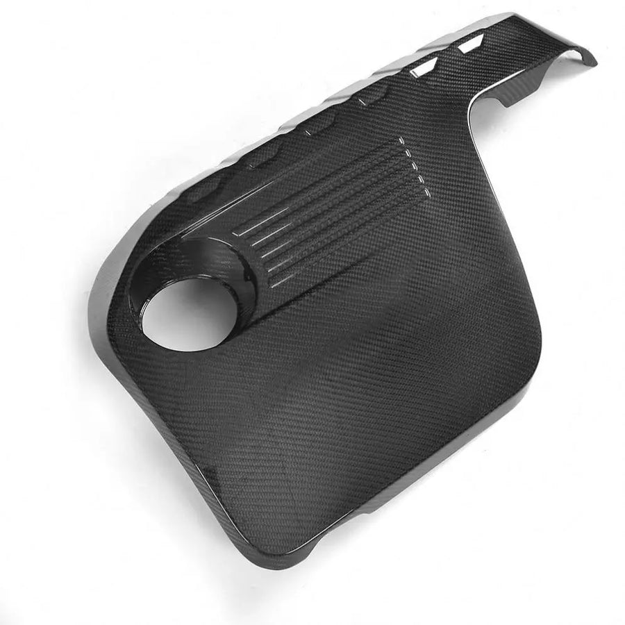 BMW F80 M3 F82 M4 carbon fibre engine cover top angle view showing carbon weave and oil cap cutout