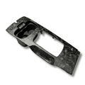 Matte forged carbon fibre shifter surround for the Ford FG Falcon, angled view on white background