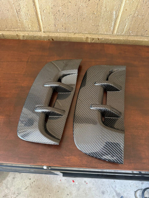RB Innovations carbon fibre fender vents on workbench