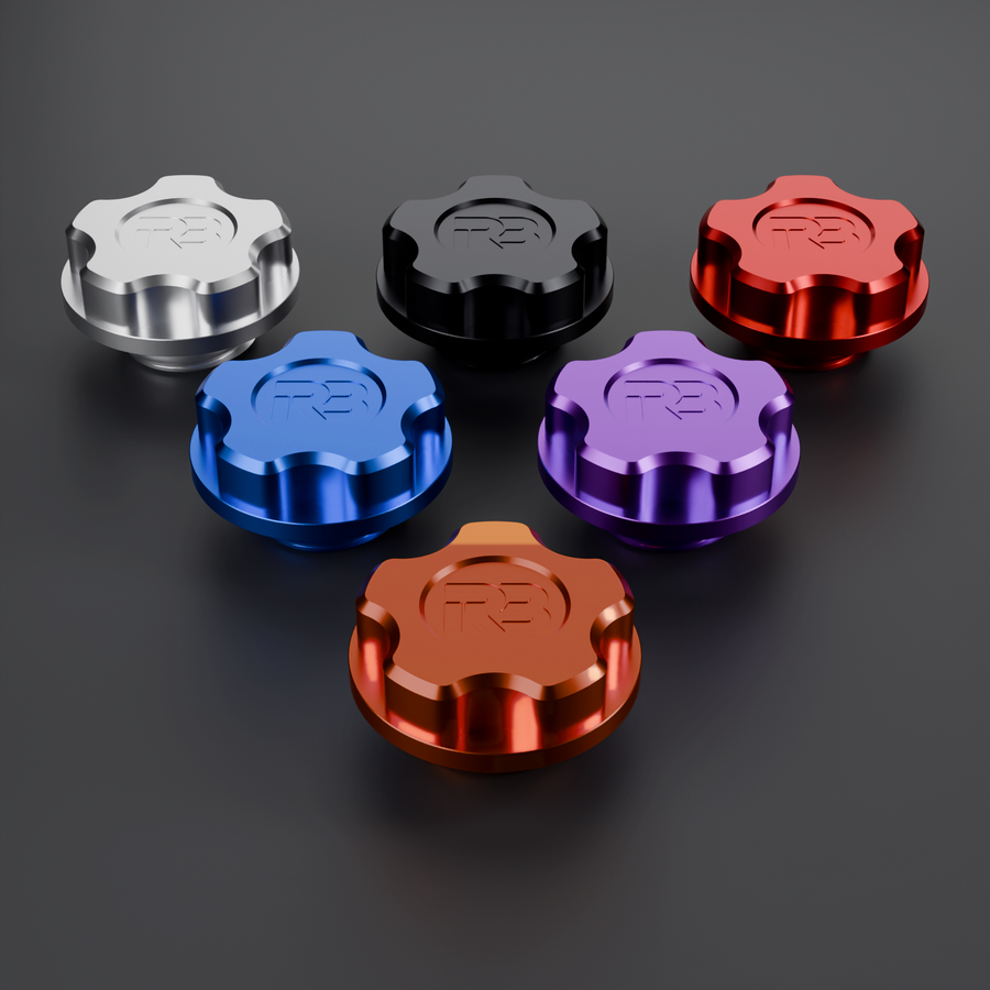 RB Innovations billet Barra oil filler caps in clear, black, red, blue, purple and orange anodised finishes