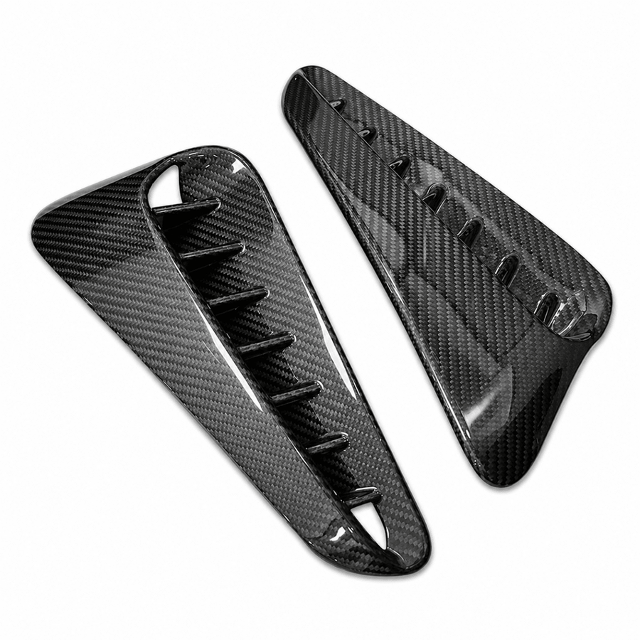 Underside view of Toyota GR Corolla dry carbon fibre side vents showing 3M automotive tape mounting and OEM-fit contour