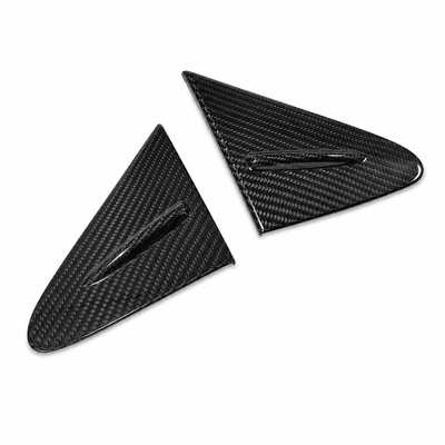 Pair of dry carbon fibre front triangular panels in gloss twill weave for the 2023+ Toyota GR Corolla by RB Innovations.