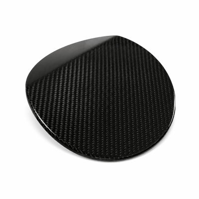 Side profile of Toyota GR Corolla dry carbon fibre gas cap cover with gloss twill weave clear coat finish